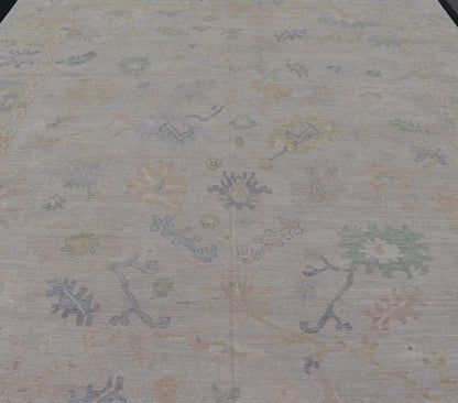 Large Oushak Rug with Floral Motifs & Muted Colorful Tones on Neutral Background. Large Oushak Rug with Floral Motifs & Muted Colorful Tones by Keivan Woven Arts. Keivan Woven Arts; rug AWR - 17857 Country of Origin: Afghanistan Type: Oushak Desi... - Keivan Woven ArtsAWR - 17857 - 25066Rug