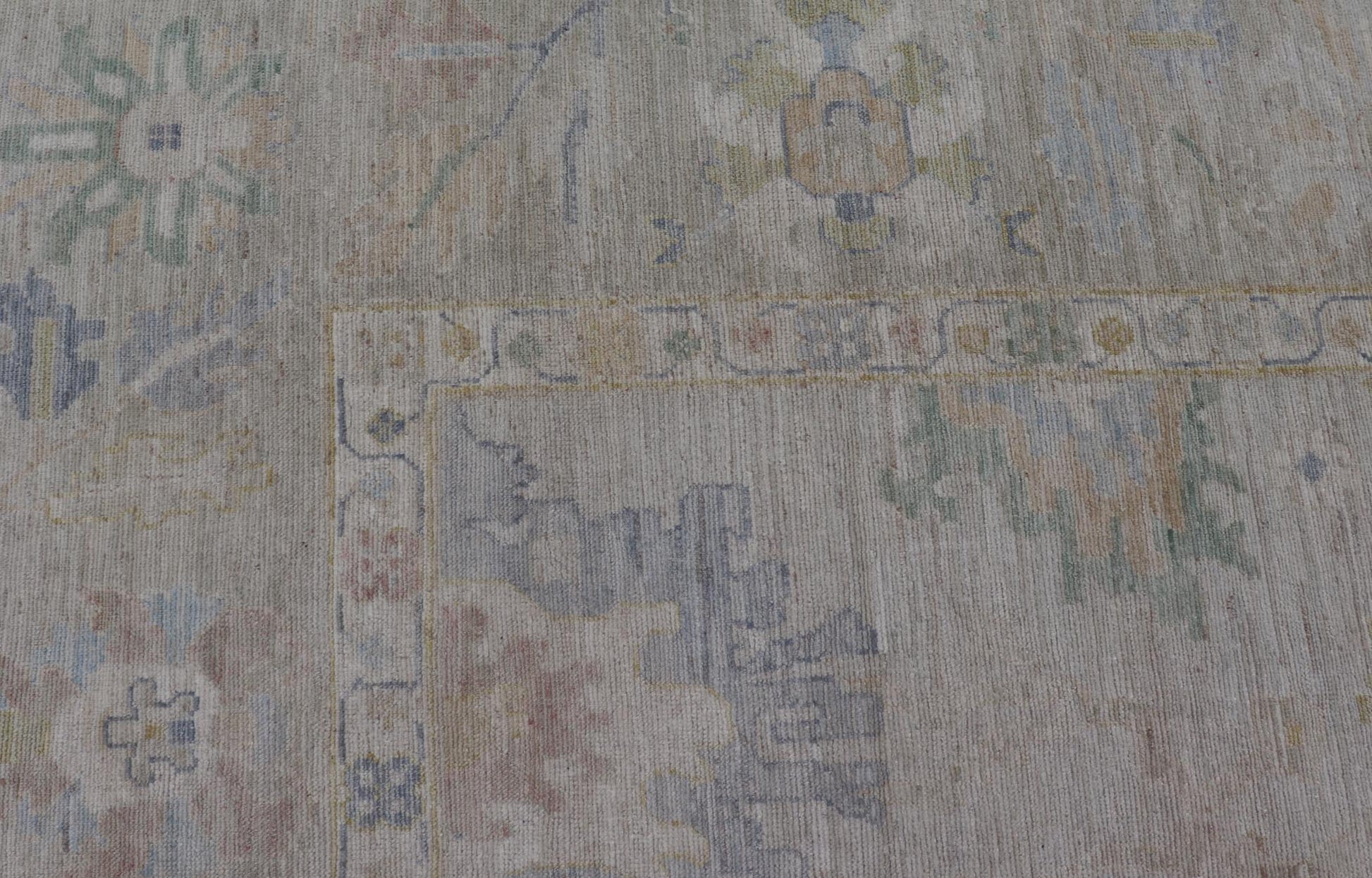 Large Oushak Rug with Floral Motifs & Muted Colorful Tones on Neutral Background. Large Oushak Rug with Floral Motifs & Muted Colorful Tones by Keivan Woven Arts. Keivan Woven Arts; rug AWR - 17857 Country of Origin: Afghanistan Type: Oushak Desi... - Keivan Woven ArtsAWR - 17857 - 25066Rug