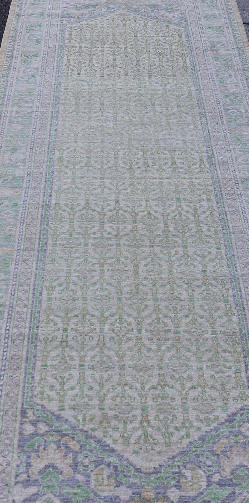 Sub - Geometric Paisley Designed Rug with Muted Tones of Green and Brown. Keivan Woven Arts rug AWR - 17859 Country of Origin: Afghanistan Type: Tabriz Design: Geometric, Mosaic Medallion Key Words. Measures: 4'0 x 11'8 This hand - knotted Tabriz fea... - Keivan Woven ArtsAWR - 17859 - 25072