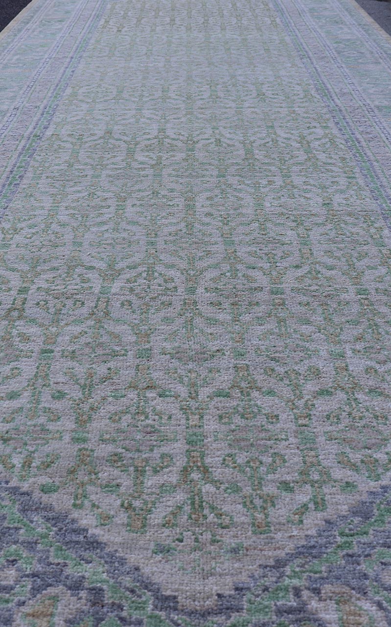 Sub - Geometric Paisley Designed Rug with Muted Tones of Green and Brown. Keivan Woven Arts rug AWR - 17859 Country of Origin: Afghanistan Type: Tabriz Design: Geometric, Mosaic Medallion Key Words. Measures: 4'0 x 11'8 This hand - knotted Tabriz fea... - Keivan Woven ArtsAWR - 17859 - 25072
