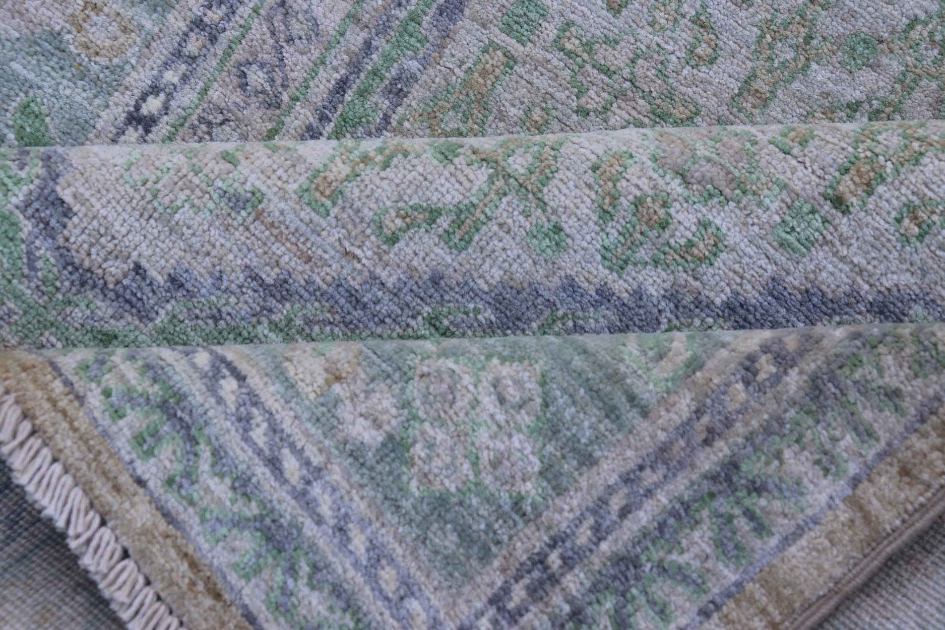 Sub - Geometric Paisley Designed Rug with Muted Tones of Green and Brown. Keivan Woven Arts rug AWR - 17859 Country of Origin: Afghanistan Type: Tabriz Design: Geometric, Mosaic Medallion Key Words. Measures: 4'0 x 11'8 This hand - knotted Tabriz fea... - Keivan Woven ArtsAWR - 17859 - 25072
