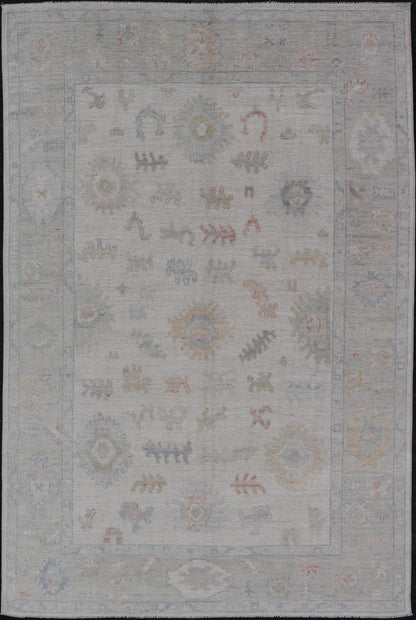 Large Oushak Rug with Floral Motifs & Muted Colorful Tones on Neutral Background. Keivan Woven Arts; rug AWR - 17881 Country of Origin: Afghanistan Type: Oushak Design. Measures: 5'10 x 9'1 This large Oushak has a border and background that are co... - Keivan Woven ArtsAWR - 17881 - 24916Rug