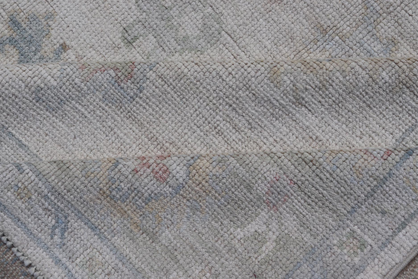 Large Oushak Rug with Floral Motifs & Muted Colorful Tones on Neutral Background. Keivan Woven Arts; rug AWR - 17881 Country of Origin: Afghanistan Type: Oushak Design. Measures: 5'10 x 9'1 This large Oushak has a border and background that are co... - Keivan Woven ArtsAWR - 17881 - 24916Rug