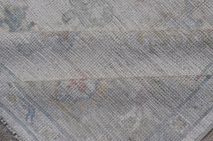 Large Oushak Rug with Floral Motifs & Muted Colorful Tones on Neutral Background. Keivan Woven Arts; rug AWR - 17881 Country of Origin: Afghanistan Type: Oushak Design. Measures: 5'10 x 9'1 This large Oushak has a border and background that are co... - Keivan Woven ArtsAWR - 17881 - 24916Rug