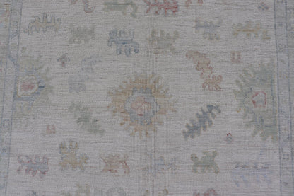 Large Oushak Rug with Floral Motifs & Muted Colorful Tones on Neutral Background. Keivan Woven Arts; rug AWR - 17881 Country of Origin: Afghanistan Type: Oushak Design. Measures: 5'10 x 9'1 This large Oushak has a border and background that are co... - Keivan Woven ArtsAWR - 17881 - 24916Rug