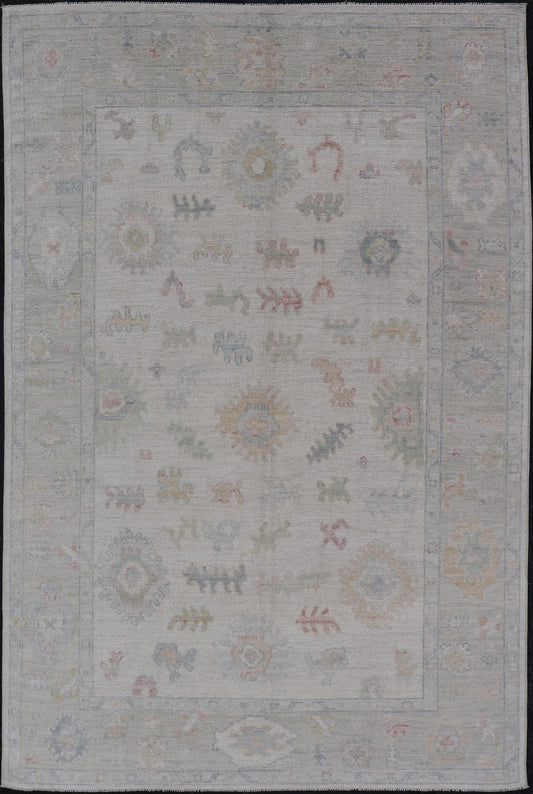 Large Oushak Rug with Floral Motifs & Muted Colorful Tones on Neutral Background. Keivan Woven Arts; rug AWR - 17881 Country of Origin: Afghanistan Type: Oushak Design. Measures: 5'10 x 9'1 This large Oushak has a border and background that are co... - Keivan Woven ArtsAWR - 17881 - 24916