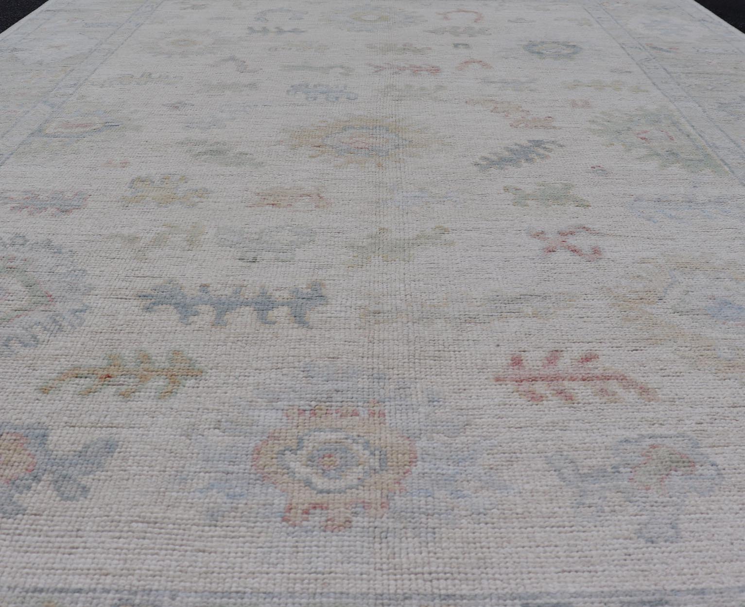 Large Oushak Rug with Floral Motifs & Muted Colorful Tones on Neutral Background. Keivan Woven Arts; rug AWR - 17881 Country of Origin: Afghanistan Type: Oushak Design. Measures: 5'10 x 9'1 This large Oushak has a border and background that are co... - Keivan Woven ArtsAWR - 17881 - 24916Rug