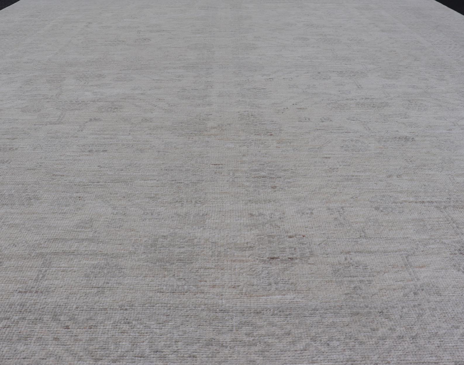 Modern All - Over Floral Khotan with Light Gray Background And Neutral Colors. Keivan Woven Arts rug AWR - 17900 Country of Origin: Afghanistan Type: Khotan Design: Floral, All - Over, Abstract Floral. Measures: 8'0 x 9'11 This Khotan was hand - knotted ... - Keivan Woven ArtsAWR - 17900 - 24922Rug