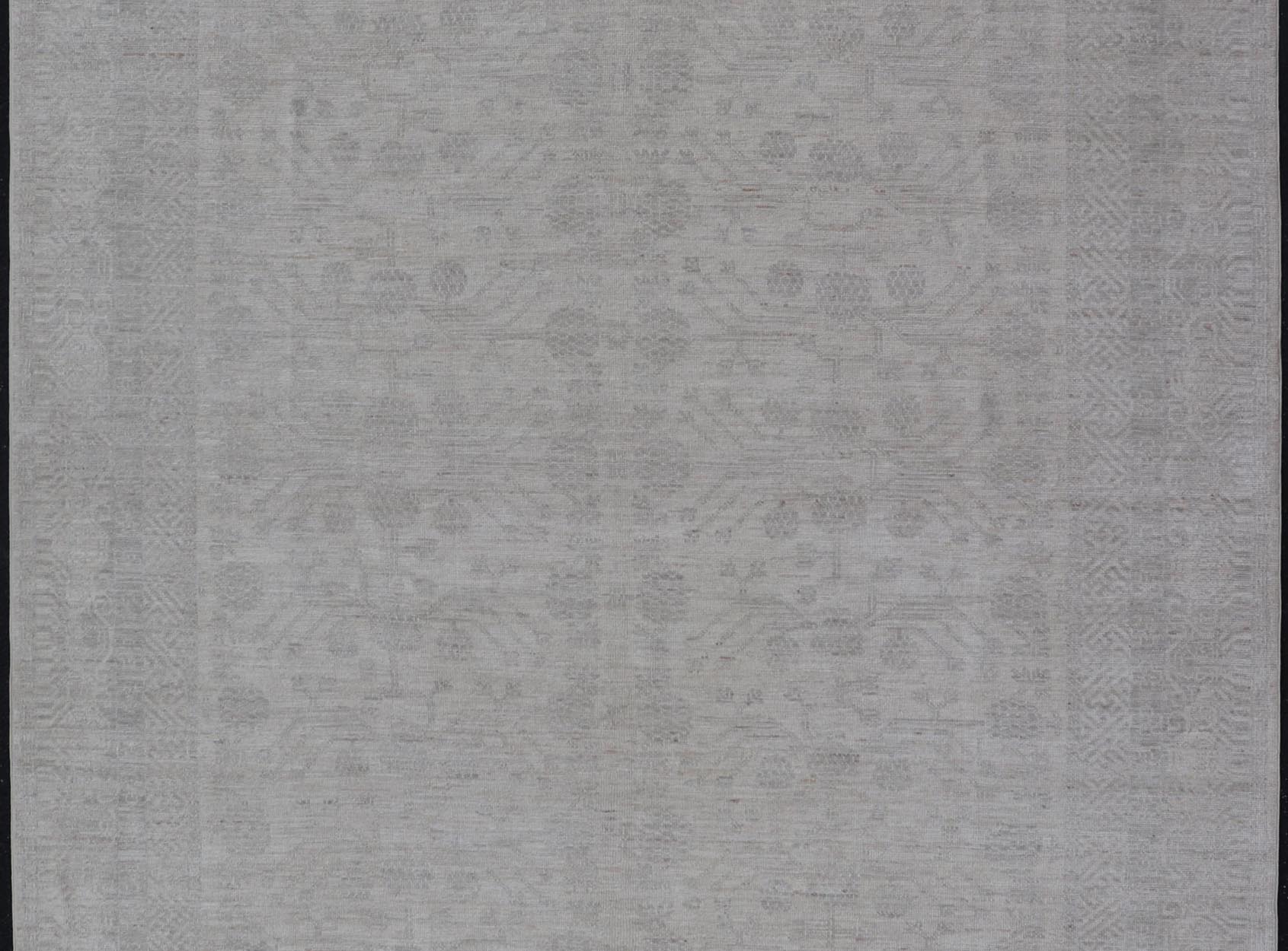 Modern All - Over Floral Khotan with Light Gray Background And Neutral Colors. Keivan Woven Arts rug AWR - 17900 Country of Origin: Afghanistan Type: Khotan Design: Floral, All - Over, Abstract Floral. Measures: 8'0 x 9'11 This Khotan was hand - knotted ... - Keivan Woven ArtsAWR - 17900 - 24922Rug