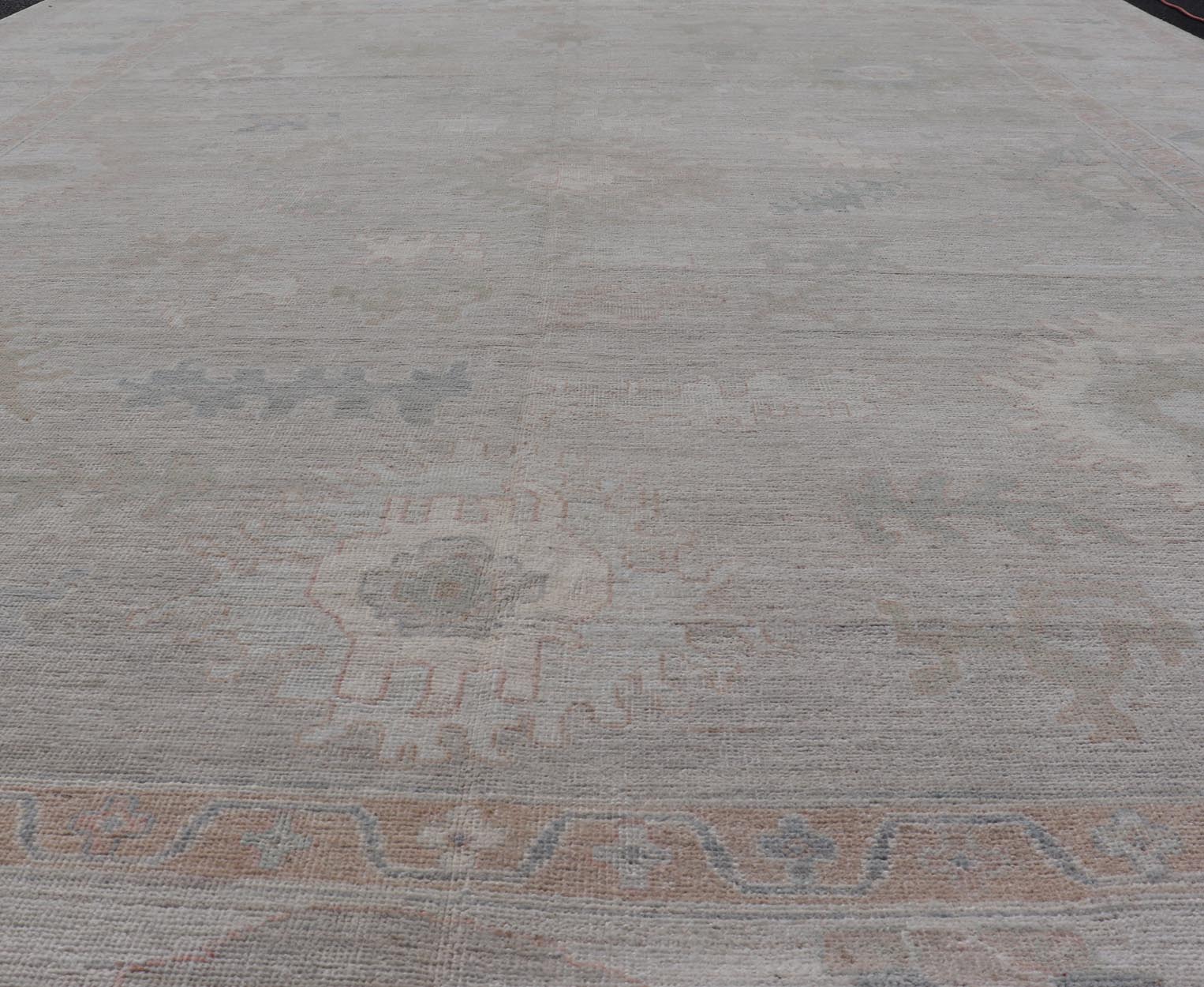 All - Over Floral Modern Oushak with Light Tan Background and Cream Border. Keivan Woven Arts rug AWR - 17919 Country of Origin: Afghanistan Type: Oushak Design: Floral, all - over, abstract floral. Measures: 10'1 x 13'10 This Oushak was hand knotted ... - Keivan Woven ArtsAWR - 17919 - 25078Rug