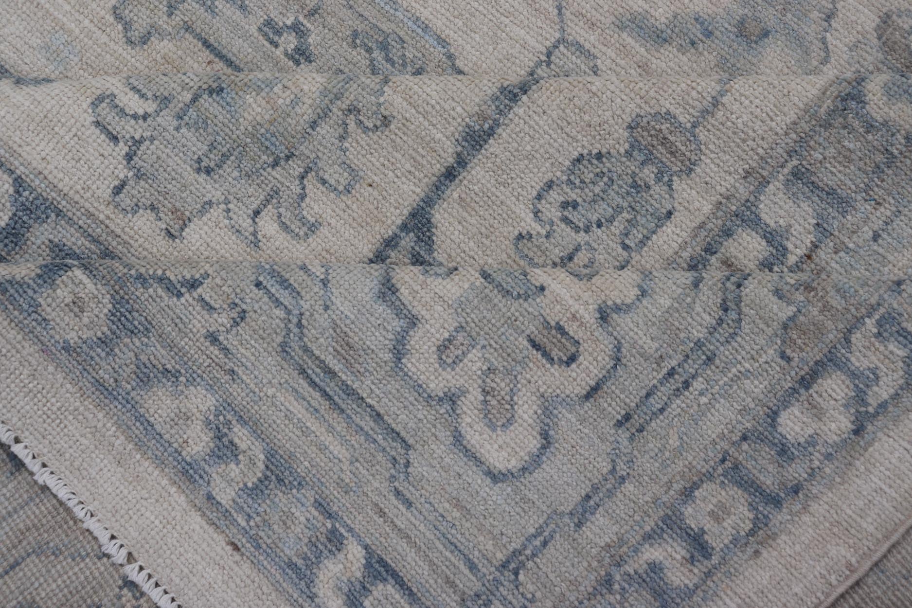 Measures: 10'6 x 14'0 Keivan Woven Arts Modern Oushak on Light Cream Background and Blue Design. Keivan Woven Arts; rug AWR - 355 Country of Origin: Afghanistan Type: Oushak Design. The border and field are covered in floral - like motifs filled wit... - Keivan Woven ArtsAWR - 355 - 27442Rug