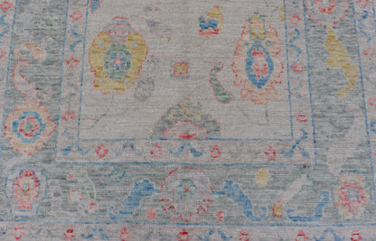 Modern All - Over Floral Oushak with Muted Background and Accent Colors Modern Oushak featuring an all - over, arabesque - like floral design, rendered in saturated oceanic blue, gold, green, red, and red - orange. The background is rendered in a co... - Keivan Woven ArtsAWR - 356 - 19959Rug
