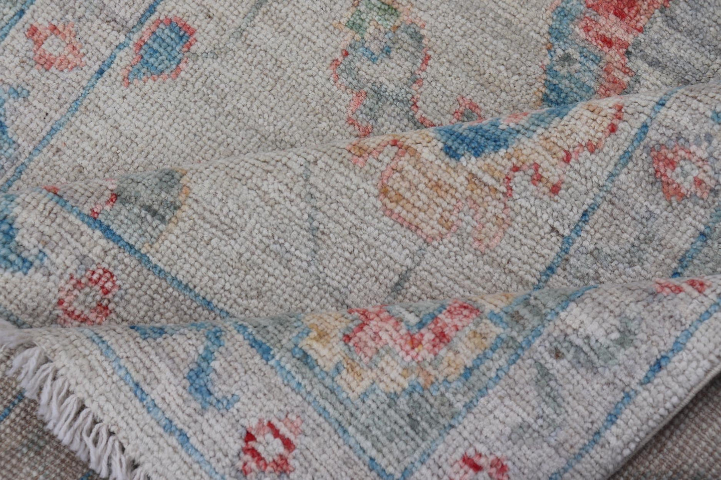 Modern All - Over Floral Oushak with Muted Background and Accent Colors Modern Oushak featuring an all - over, arabesque - like floral design, rendered in saturated oceanic blue, gold, green, red, and red - orange. The background is rendered in a co... - Keivan Woven ArtsAWR - 356 - 19959Rug
