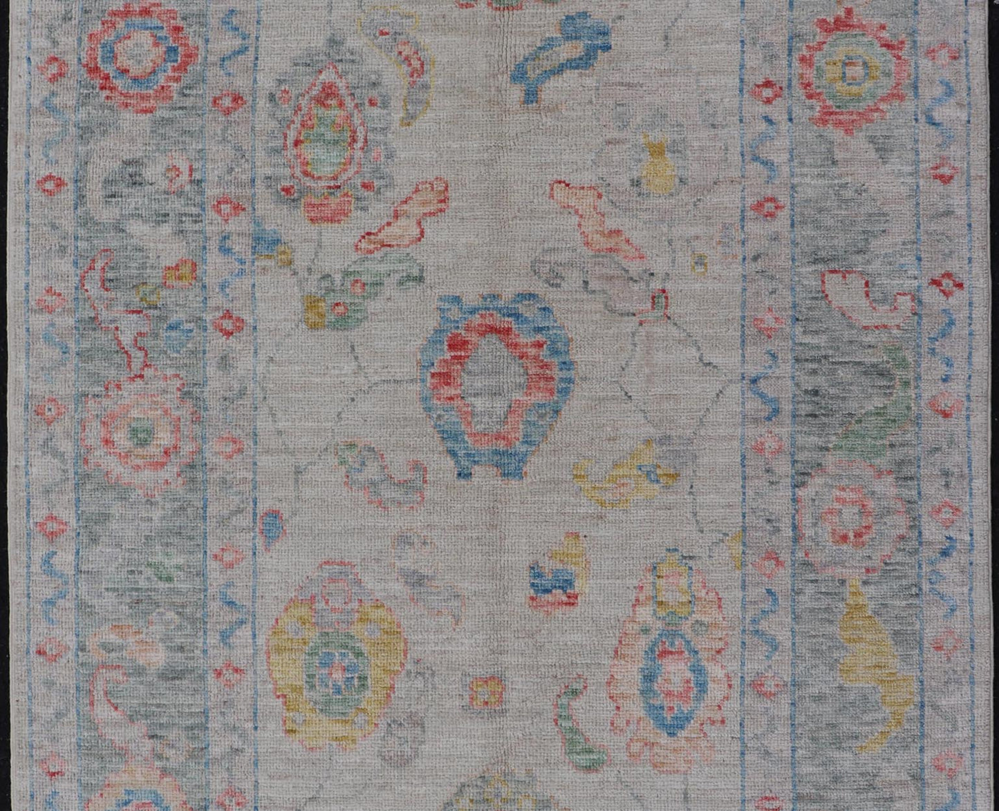 Modern All - Over Floral Oushak with Muted Background and Accent Colors Modern Oushak featuring an all - over, arabesque - like floral design, rendered in saturated oceanic blue, gold, green, red, and red - orange. The background is rendered in a co... - Keivan Woven ArtsAWR - 356 - 19959Rug