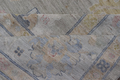 Measures: 12'1 x 17'10 Modern Large Oushak by Keivan Woven Arts with Floral Motifs. Keivan Woven Arts; rug AWR - 405 Country of Origin: Afghanistan Type: Oushak Design. This large Oushak has a border and background that are covered in floral - l... - Keivan Woven ArtsAWR - 405 - 27454Rug