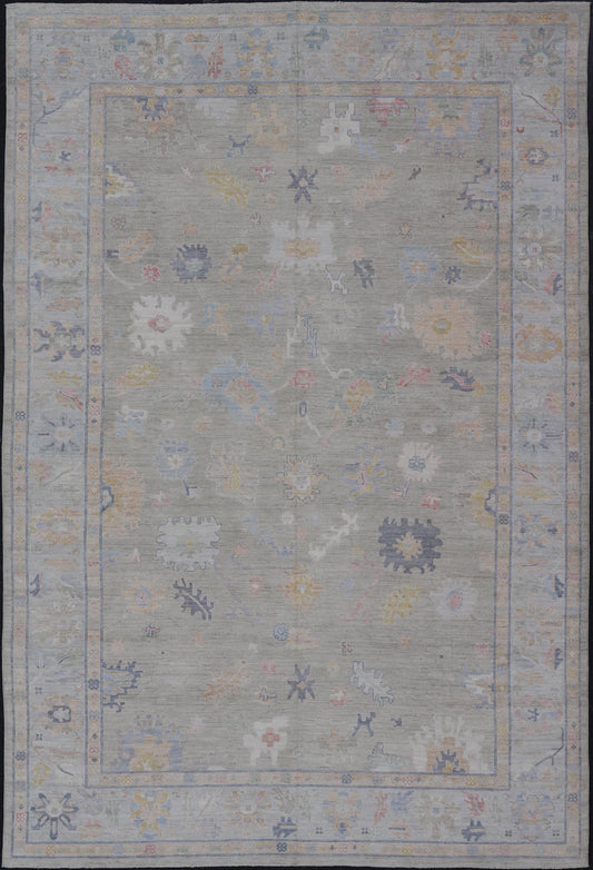 Measures: 12'1 x 17'10 Modern Large Oushak by Keivan Woven Arts with Floral Motifs. Keivan Woven Arts; rug AWR - 405 Country of Origin: Afghanistan Type: Oushak Design. This large Oushak has a border and background that are covered in floral - l... - Keivan Woven ArtsAWR - 405 - 27454Rug