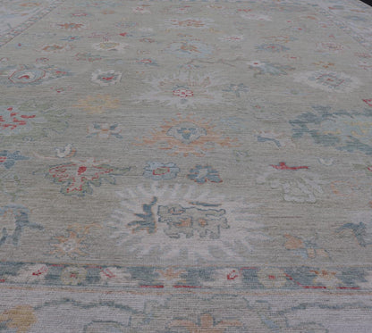 Measures: 10'2 x 13'9 Keivan Woven Arts Modern Oushak Rug in All - Over Floral Motifs. Keivan Woven Arts; rug AWR - 440 Country of Origin: Afghanistan Type: Oushak Design: All - Over, Floral. - Keivan Woven ArtsAWR - 440 - 27460Rug