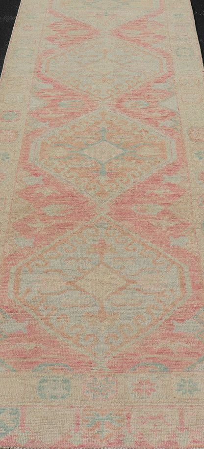 Modern Hand Knotted Oushak Runner With Medallions in Pink's and Creams. Keivan Woven Arts; AWR - 4982 Country of Origin: Afghanistan Type: Oushak Design: Tribal, Measures: 3'0 x 12'9 This long Oushak runner has a light pink background with ... - Keivan Woven ArtsAWR - 4982 - 17136Rug