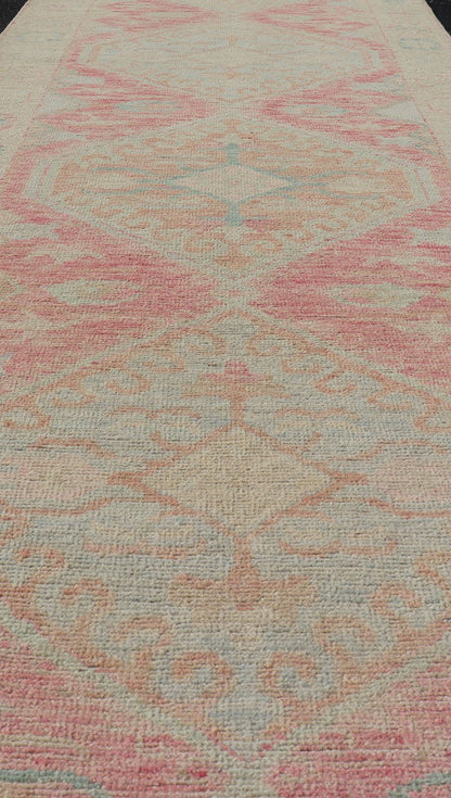Modern Hand Knotted Oushak Runner With Medallions in Pink's and Creams. Keivan Woven Arts; AWR - 4982 Country of Origin: Afghanistan Type: Oushak Design: Tribal, Measures: 3'0 x 12'9 This long Oushak runner has a light pink background with ... - Keivan Woven ArtsAWR - 4982 - 17136Rug
