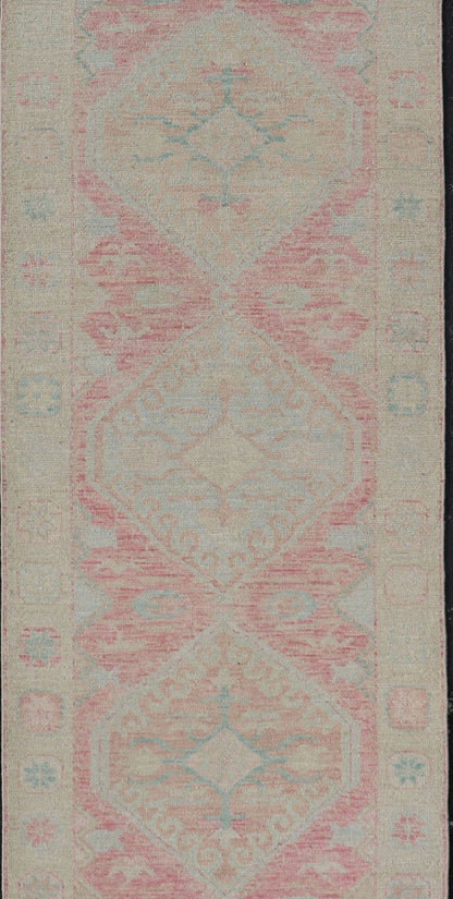 Modern Hand Knotted Oushak Runner With Medallions in Pink's and Creams. Keivan Woven Arts; AWR - 4982 Country of Origin: Afghanistan Type: Oushak Design: Tribal, Measures: 3'0 x 12'9 This long Oushak runner has a light pink background with ... - Keivan Woven ArtsAWR - 4982 - 17136Rug