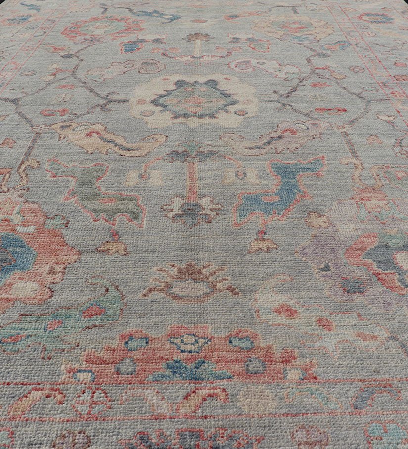 Modern All - Over Floral Oushak With a Light Blue - Gray Background And Multi - Colors. Keivan Woven Arts; rug AWR - 5109 Country of Origin: Afghanistan Type: Oushak Design: Floral, All - Over, Abstract Floral Measures: 5'0 x 7'6 This modern floral... - Keivan Woven ArtsAWR - 5109 - 17166Rug