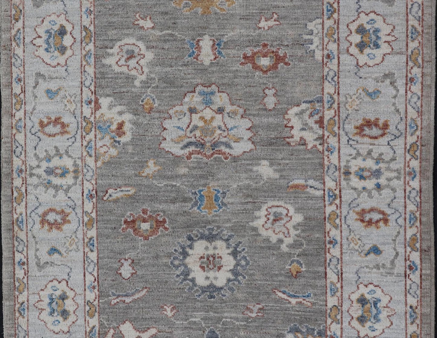 Floral Designed Oushak with Muted Background With Earthy Tones and Soft Blue Modern Oushak featuring an all - over, arabesque - like floral design. The background is rendered in a light gray, while the border is s light pewter blue. The design d... - Keivan Woven ArtsAWR - 6028 - 19971Rug