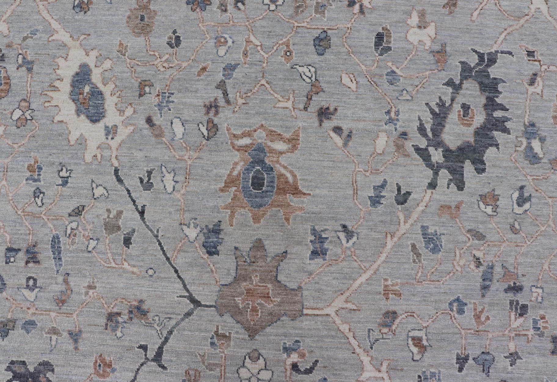 Large Afghan Floral Oushak with Muted Background in Wool With All - Over Design This hand - knotted Oushak has a very classic feel with a slight twist. This rug only has one background color, reaching from border to field in a muted gray tone. The d... - Keivan Woven ArtsAWR - 6041 - 19983Rug