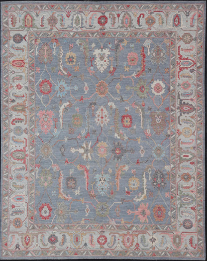 Large Afghan Oushak Design with All - Over Multi Colored Floral Design in Wool This piece has very rich colors, from the enhanced dark gray - blue background, to the saturated tropical pinks and blues, oranges and taupe used in the design, The sligh... - Keivan Woven ArtsAWR - 6045 - 19995Rug