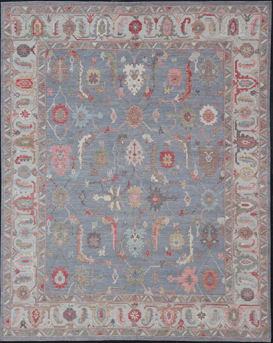 Large Afghan Oushak Design with All - Over Multi Colored Floral Design in Wool This piece has very rich colors, from the enhanced dark gray - blue background, to the saturated tropical pinks and blues, oranges and taupe used in the design, The sligh... - Keivan Woven ArtsAWR - 6045 - 19995Rug