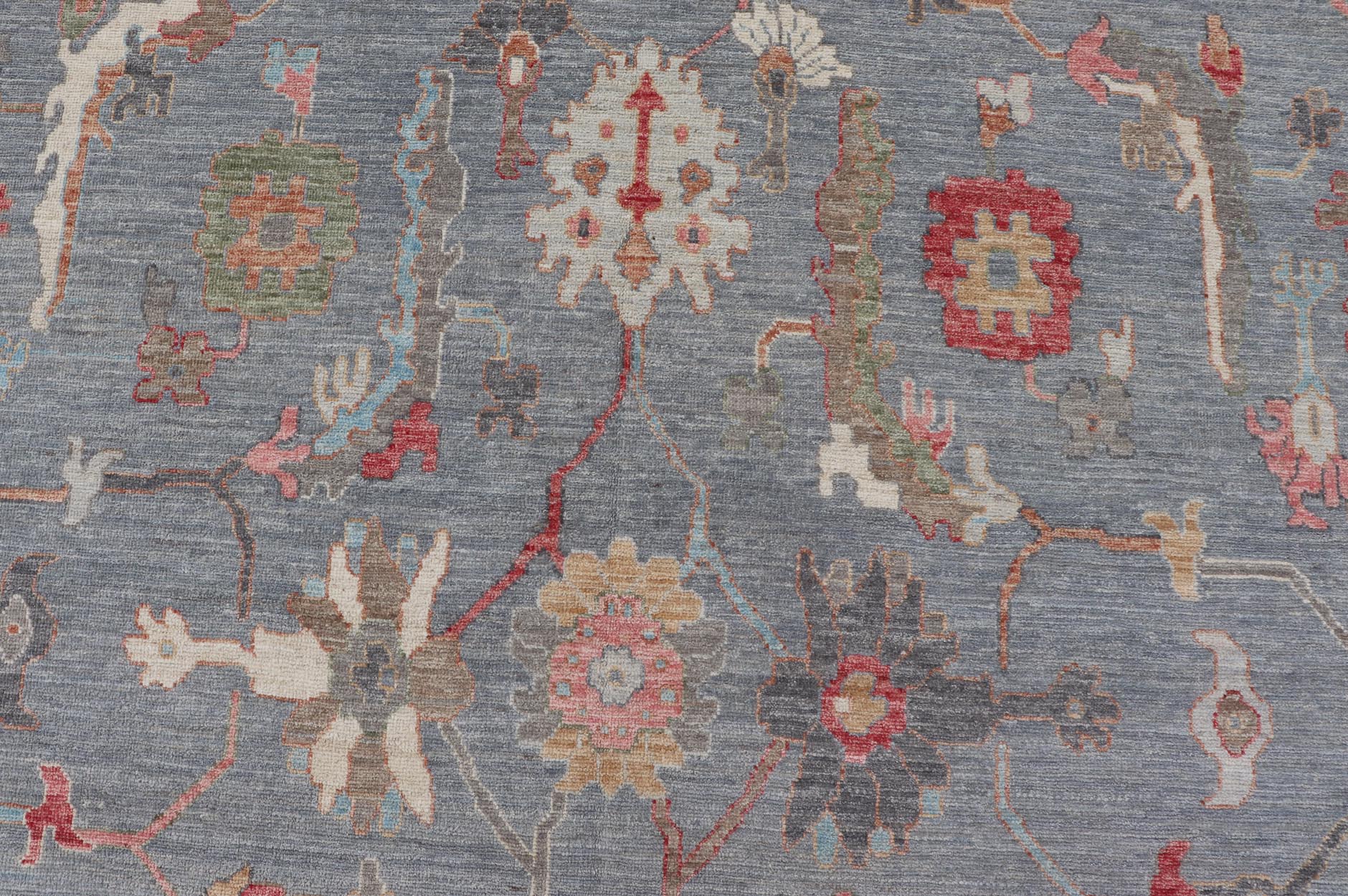 Large Afghan Oushak Design with All - Over Multi Colored Floral Design in Wool This piece has very rich colors, from the enhanced dark gray - blue background, to the saturated tropical pinks and blues, oranges and taupe used in the design, The sligh... - Keivan Woven ArtsAWR - 6045 - 19995Rug