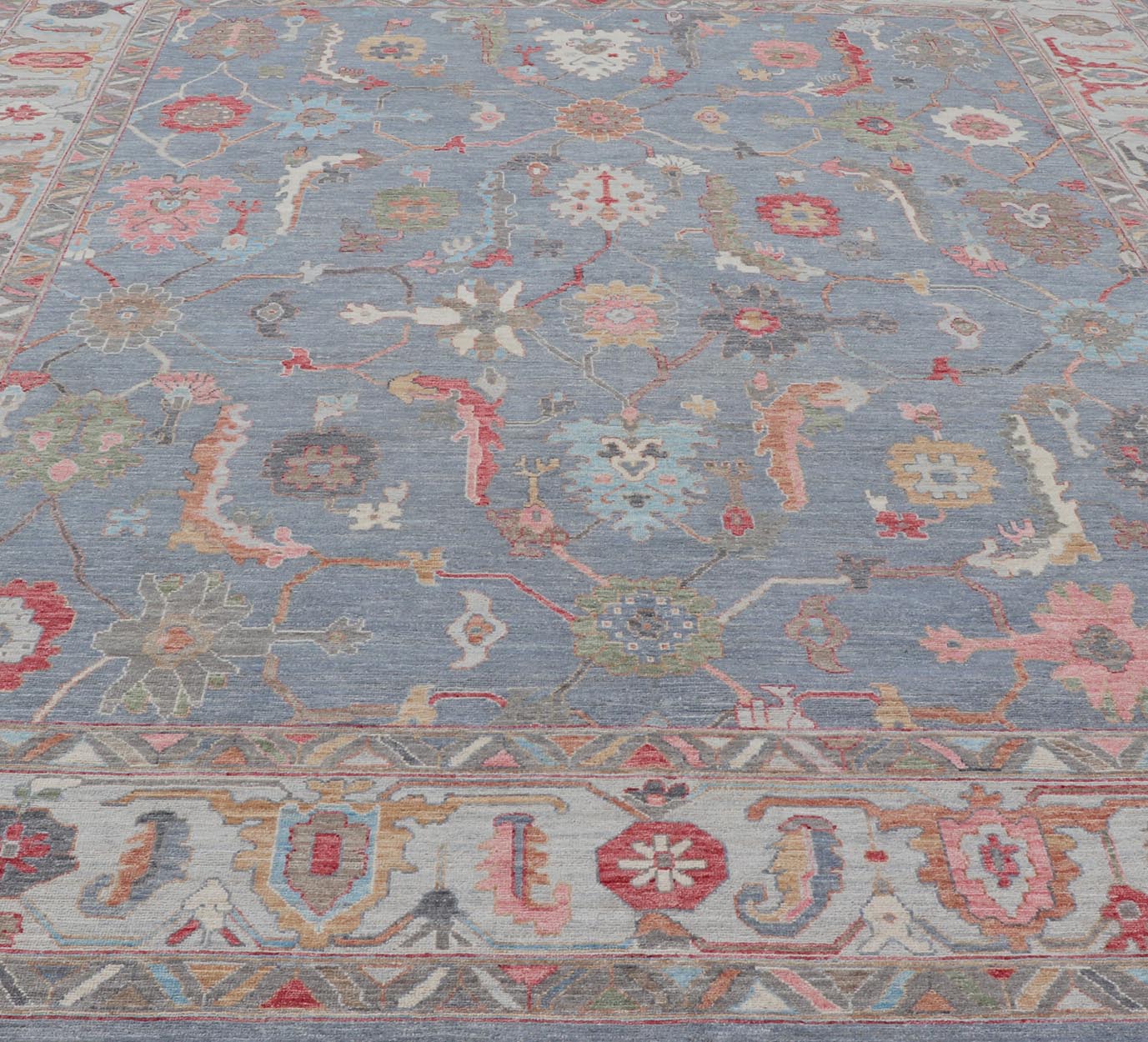 Large Afghan Oushak Design with All - Over Multi Colored Floral Design in Wool This piece has very rich colors, from the enhanced dark gray - blue background, to the saturated tropical pinks and blues, oranges and taupe used in the design, The sligh... - Keivan Woven ArtsAWR - 6045 - 19995Rug