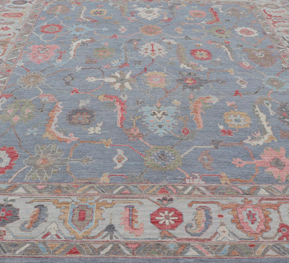 Large Afghan Oushak Design with All - Over Multi Colored Floral Design in Wool This piece has very rich colors, from the enhanced dark gray - blue background, to the saturated tropical pinks and blues, oranges and taupe used in the design, The sligh... - Keivan Woven ArtsAWR - 6045 - 19995Rug