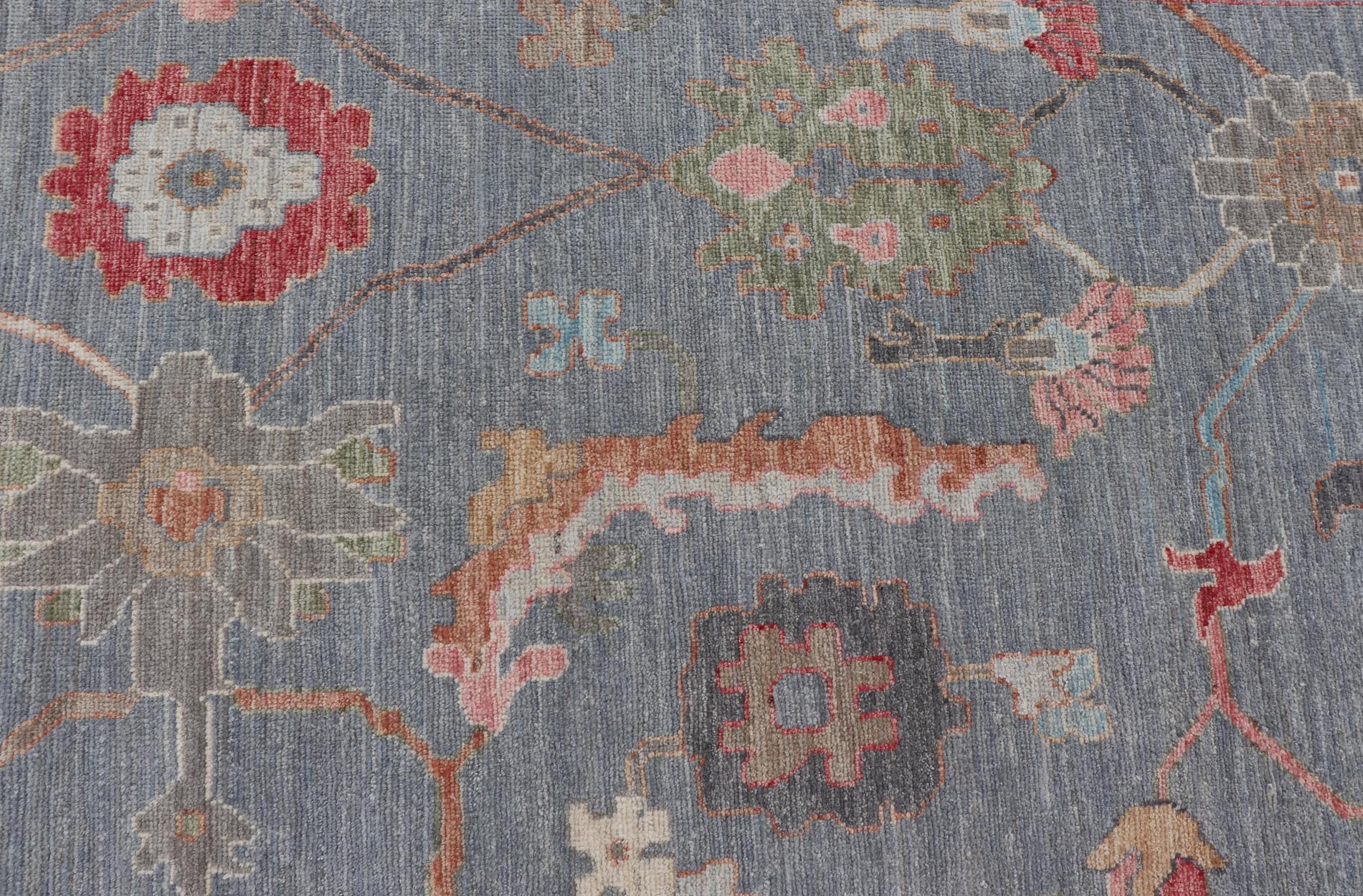 Large Afghan Oushak Design with All - Over Multi Colored Floral Design in Wool This piece has very rich colors, from the enhanced dark gray - blue background, to the saturated tropical pinks and blues, oranges and taupe used in the design, The sligh... - Keivan Woven ArtsAWR - 6045 - 19995Rug