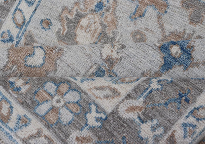 Hand - Knotted All - Over Floral Modern Oushak With Light Brown Border This beautiful contemporary piece starts with a floral border. The field has a modest silvery background with an all - over design rendered with earthy tones, such as wood brown, t... - Keivan Woven ArtsAWR - 6060 - 20001Rug