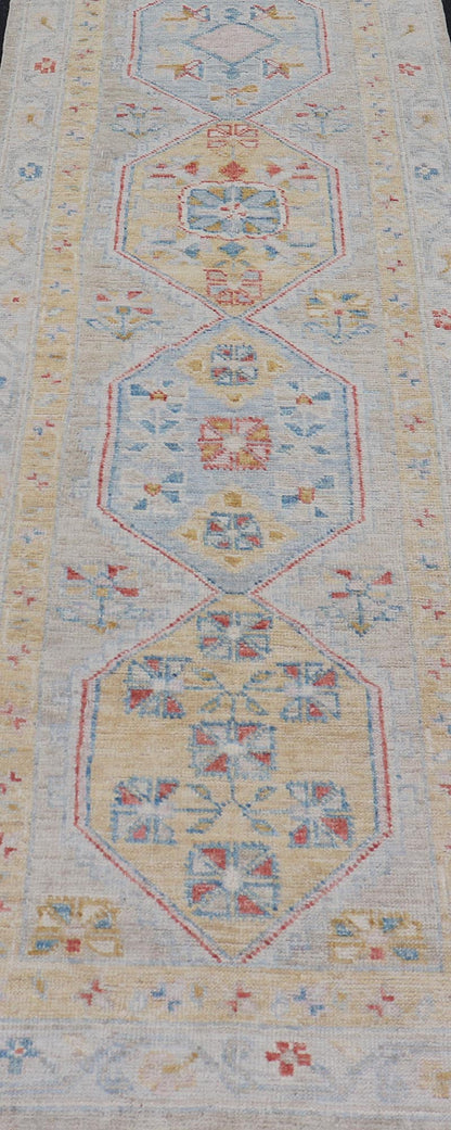 Hand - Knotted Medallion Oushak Design Runner featuring Faded Yellow and Blue's This piece showcases brilliant medallions encasing motifs in buttery yellow, light blue, cream, and shades of blue. The border displays a yellow guard border with a cr... - Keivan Woven ArtsAWR - 6117 - 20019Rug