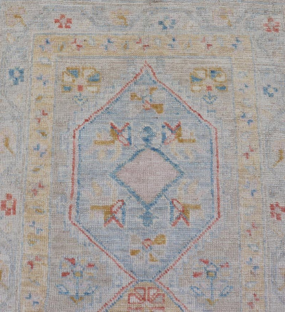 Hand - Knotted Medallion Oushak Design Runner featuring Faded Yellow and Blue's This piece showcases brilliant medallions encasing motifs in buttery yellow, light blue, cream, and shades of blue. The border displays a yellow guard border with a cr... - Keivan Woven ArtsAWR - 6117 - 20019Rug
