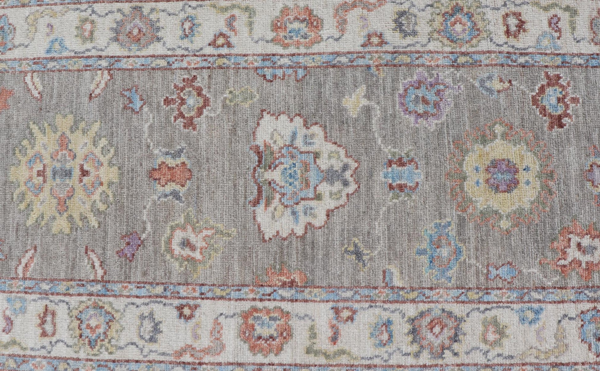Hand - Knotted Modern Oushak Runner on Light Gray Field and Colorful Motifs This Oushak runner has been hand - knotted. The arabesque motifs scatter atop a light gray background. Within the field, bright displays of gold, teal, blue, pink, maroon, ... - Keivan Woven ArtsAWR - 6196 - 19899Rug