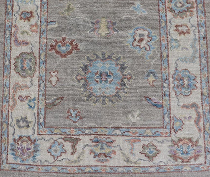 Hand - Knotted Modern Oushak Runner on Light Gray Field and Colorful Motifs This Oushak runner has been hand - knotted. The arabesque motifs scatter atop a light gray background. Within the field, bright displays of gold, teal, blue, pink, maroon, ... - Keivan Woven ArtsAWR - 6196 - 19899Rug