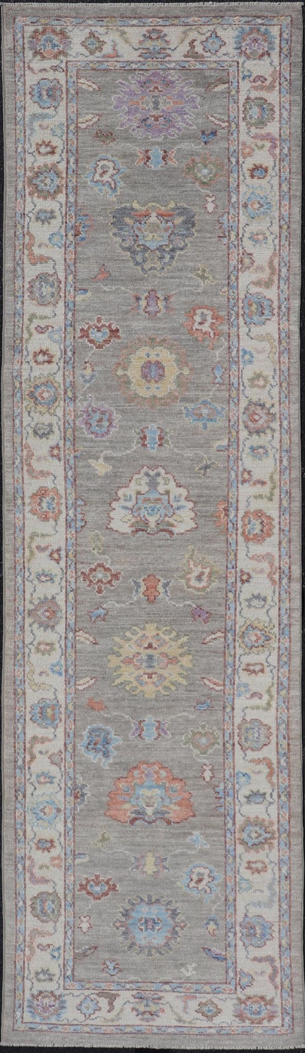 Hand - Knotted Modern Oushak Runner on Light Gray Field and Colorful Motifs This Oushak runner has been hand - knotted. The arabesque motifs scatter atop a light gray background. Within the field, bright displays of gold, teal, blue, pink, maroon, ... - Keivan Woven ArtsAWR - 6196 - 19899Rug