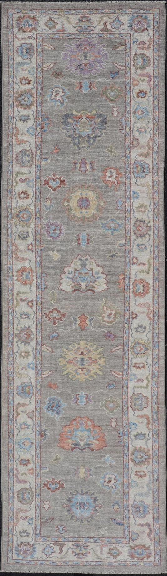 Hand - Knotted Modern Oushak Runner on Light Gray Field and Colorful Motifs This Oushak runner has been hand - knotted. The arabesque motifs scatter atop a light gray background. Within the field, bright displays of gold, teal, blue, pink, maroon, ... - Keivan Woven ArtsAWR - 6196 - 19899Rug
