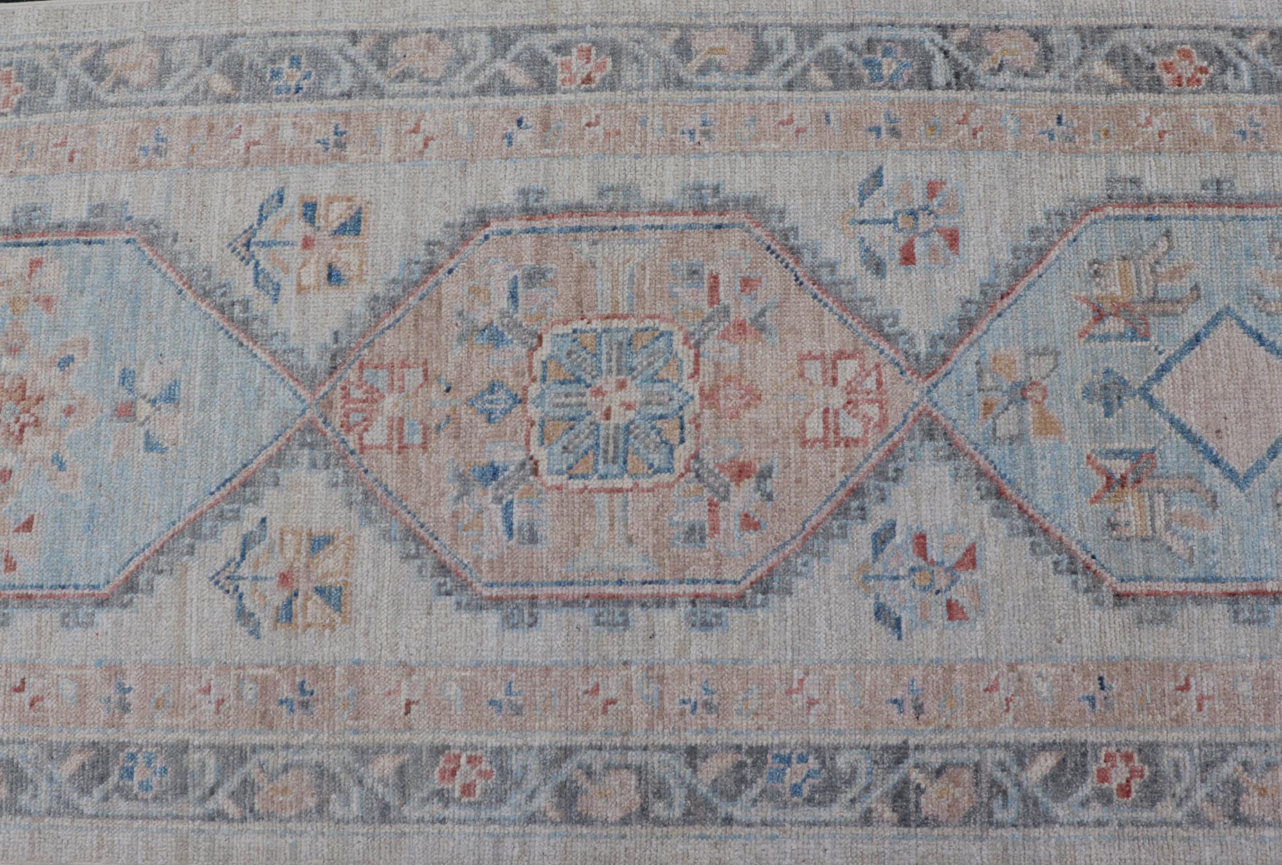 Modern Oushak Medallion Runner in Pastel Color Tones This Afghan Oushak presents a double - lined floral border on top of a light gray background, accenting colors such as blue, red, and salmon. These mix of tones gives a great contrast to many in... - Keivan Woven ArtsAWR - 6290 - 20037Rug
