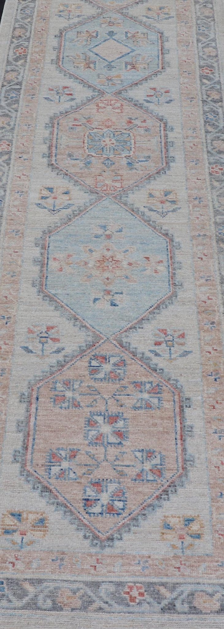 Modern Oushak Medallion Runner in Pastel Color Tones This Afghan Oushak presents a double - lined floral border on top of a light gray background, accenting colors such as blue, red, and salmon. These mix of tones gives a great contrast to many in... - Keivan Woven ArtsAWR - 6290 - 20037Rug