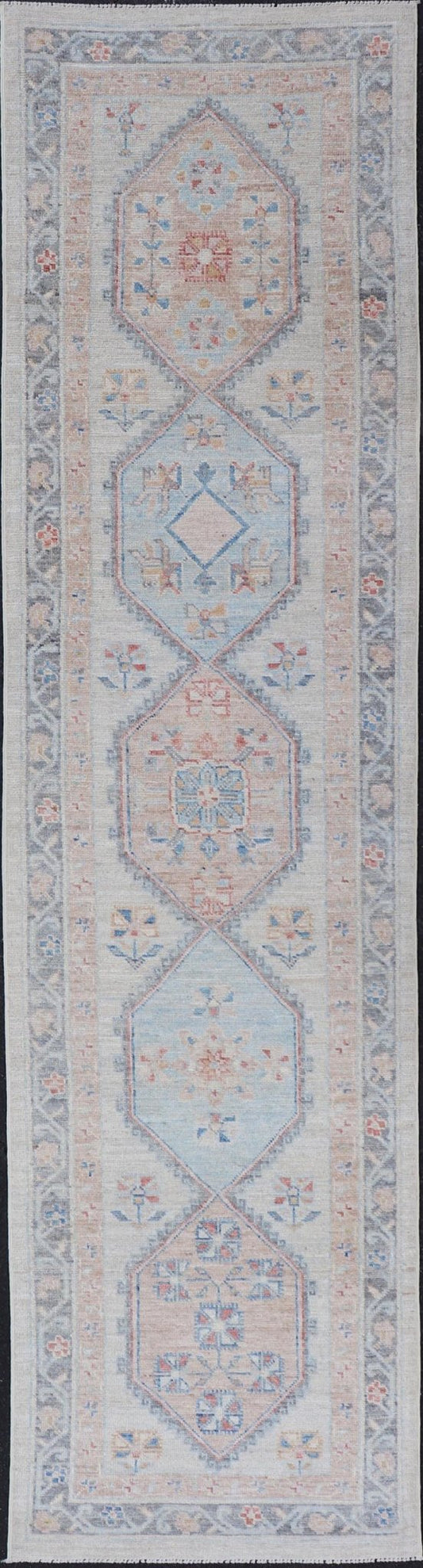 Modern Oushak Medallion Runner in Pastel Color Tones This Afghan Oushak presents a double - lined floral border on top of a light gray background, accenting colors such as blue, red, and salmon. These mix of tones gives a great contrast to many in... - Keivan Woven ArtsAWR - 6290 - 20037Rug