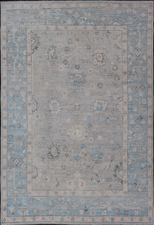 Hand - Knotted Light Blue Oushak with Light Gray Background Hand - Knotted in Afghanistan, this rustic piece holds charm within a powder blue border and a light gray field background. Above lays a modest Oushak - styled floral design reaching all ... - Keivan Woven ArtsAWR - 6309 - 20049Rug