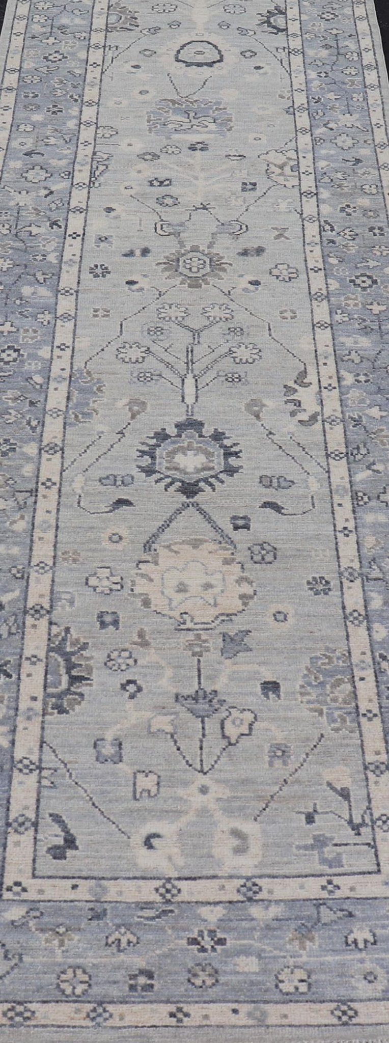 Modern Oushak Design With Light Blue Background and All - Over Design This Afghan runner features a classic Oushak look, showing off brilliant floral motifs and vines reaching all over the field against a cool gray and pewter background. Central ... - Keivan Woven ArtsAWR - 6325 - 20061Rug