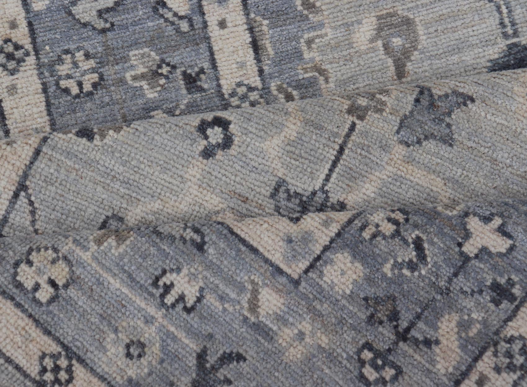 Modern Oushak Design With Light Blue Background and All - Over Design This Afghan runner features a classic Oushak look, showing off brilliant floral motifs and vines reaching all over the field against a cool gray and pewter background. Central ... - Keivan Woven ArtsAWR - 6325 - 20061Rug
