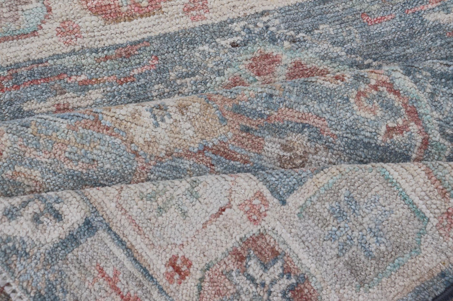 Medallion Designed Modern Oushak with Light Blue Background and Cream Border This modern Oushak features large medallions in the center of a light blue background, centering around shades of blue, coral, and light green. The border features seve... - Keivan Woven ArtsAWR - 6363 - 20073Rug