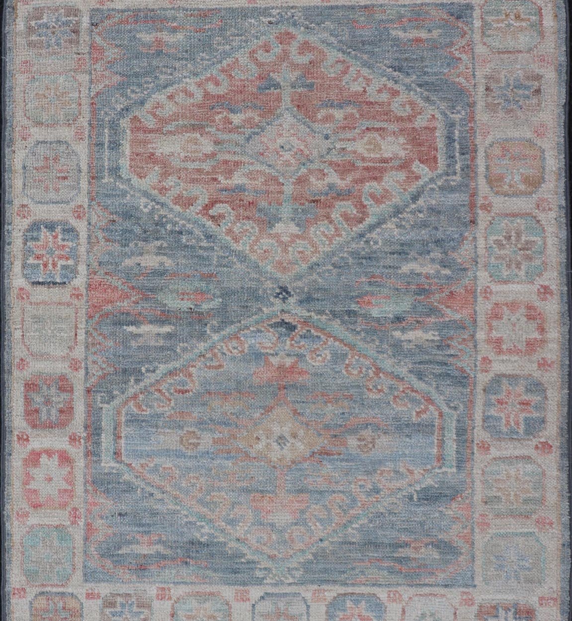 Medallion Designed Modern Oushak with Light Blue Background and Cream Border This modern Oushak features large medallions in the center of a light blue background, centering around shades of blue, coral, and light green. The border features seve... - Keivan Woven ArtsAWR - 6363 - 20073Rug