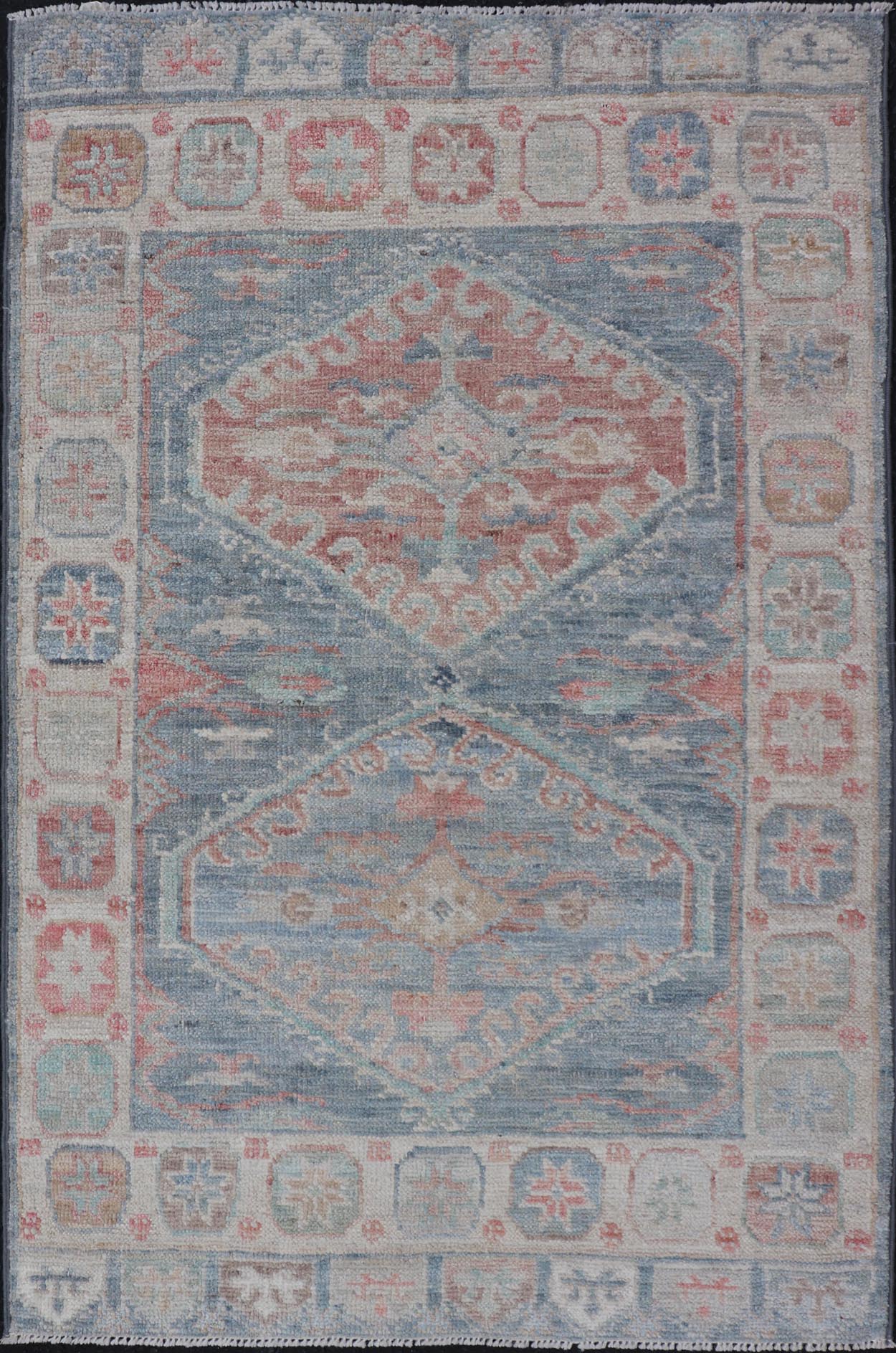 Medallion Designed Modern Oushak with Light Blue Background and Cream Border This modern Oushak features large medallions in the center of a light blue background, centering around shades of blue, coral, and light green. The border features seve... - Keivan Woven ArtsAWR - 6363 - 20073Rug
