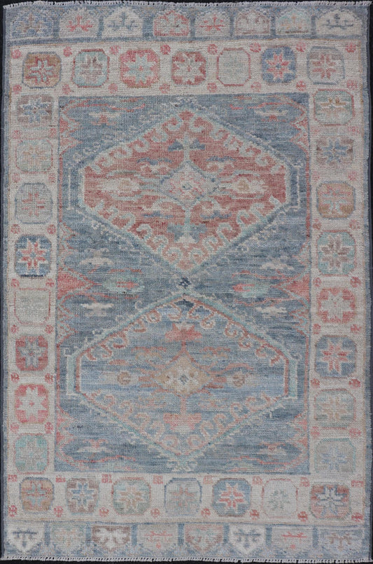 Medallion Designed Modern Oushak with Light Blue Background and Cream Border This modern Oushak features large medallions in the center of a light blue background, centering around shades of blue, coral, and light green. The border features seve... - Keivan Woven ArtsAWR - 6363 - 20073Rug